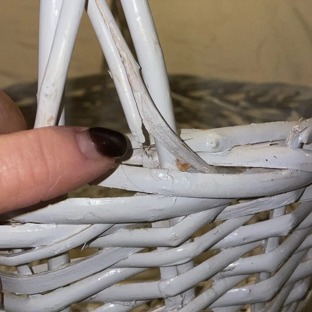 Pretty White Basket with Handle. Note where I pointed has a broken piece.